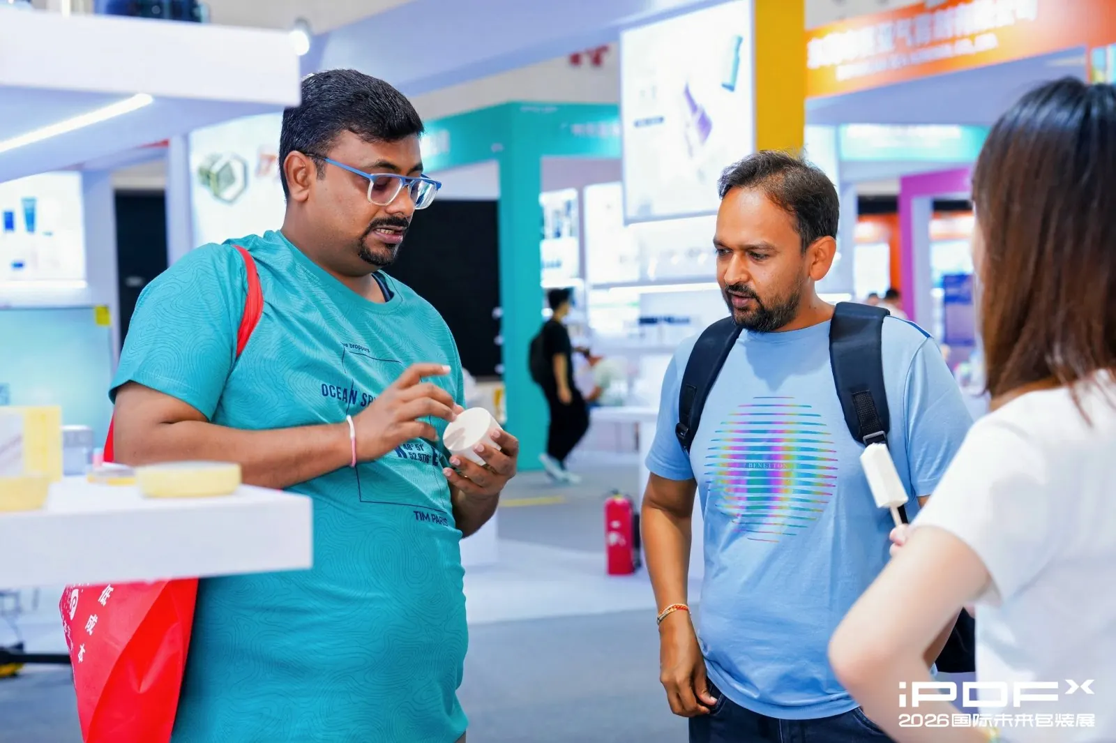 2026 · Third edition. An international buyer evaluates packaging products at iPDF. Photograph 1.